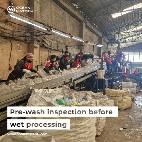 Workers conduct pre-wash visual inspection of plastic bottles on a conveyor belt before wet processing. Text overlay reads: “Pre-wash inspection before wet processing”.